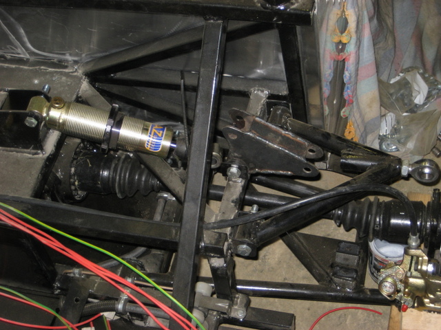 Inboard rear suspension